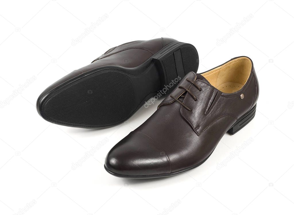 Classic brown mans handcrafted leather shoes isolated on white