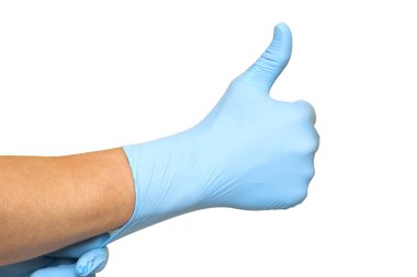 Approv gibi jest veya thumbup gösteren eldiven ile Doktor el
