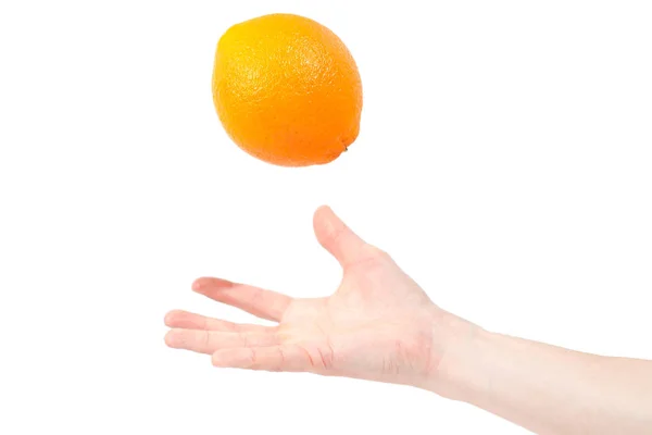Ripe juicy orange in hand isolated on white background. Healthy — Stock Photo, Image