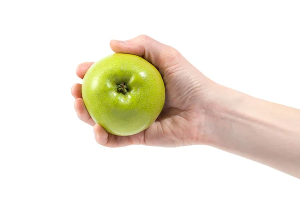 Zralé lahodné šťavnaté zelené jablko v ruce izolované na bílém pozadí — Stock fotografie
