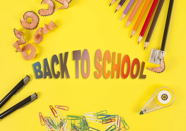 Some colored pencils of different colors and a pencil sharpener — Stock Photo, Image