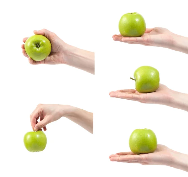 Спелые вкусные сочные зеленое яблоко в руке изолированы на белом спинке — стоковое фото