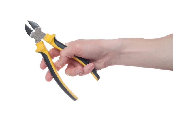 Mão de homem segurando um cortador de fio preto e amarelo. Aberto, limpo , — Fotografia de Stock
