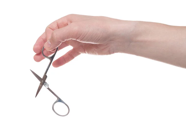 Hand holding scissors for manicure isolated on white background. — Stock Photo, Image