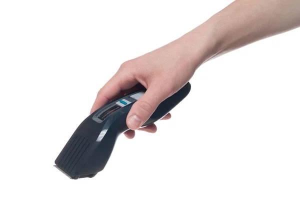 El tutan Elektrikli saç makası beyaz arka plan üzerinde izole