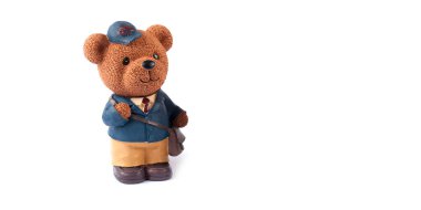 Beyaz arka planda izole edilmiş plastik oyuncak ayı. 