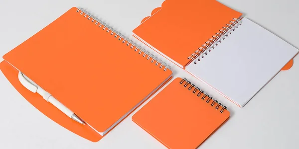 Business Concept Top View Collection Orange Notebook White Background Desk — Φωτογραφία Αρχείου