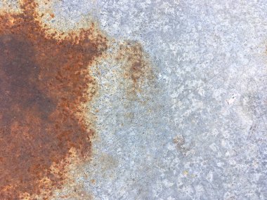 Paslı, eski, pürüzlü, metal bir doku. İç dekorasyon ve endüstriyel yapı tasarımı için koyu paslı metal desen arka planı. Vintage effec