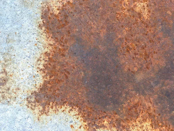 Paslı, eski, pürüzlü, metal bir doku. İç dekorasyon ve endüstriyel yapı tasarımı için koyu paslı metal desen arka planı. Vintage effec