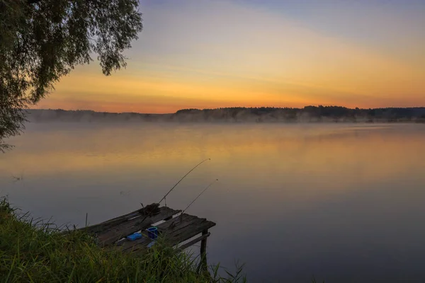 Walk with morning fog on the lake. Fishing at dawn. Kiev region, Ukraine. 20 September 2020