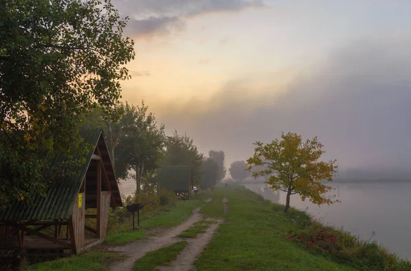 Walk on the lake in the morning fog. Fishing at dawn. Kiev region, Ukraine. September 10, 2020