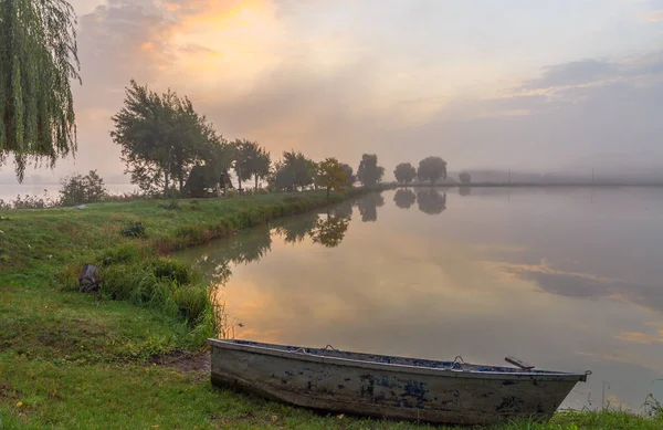 Walk on the lake in the morning fog. Fishing at dawn. Kiev region, Ukraine. September 10, 2020