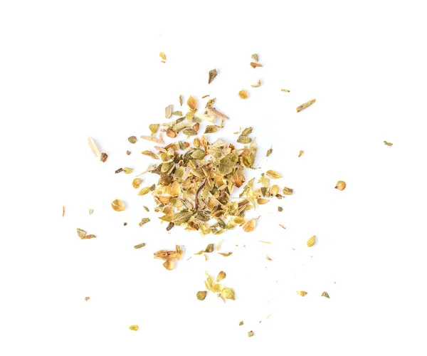 Pile of dried oregano leaves on a white background. top view — Stock Photo, Image