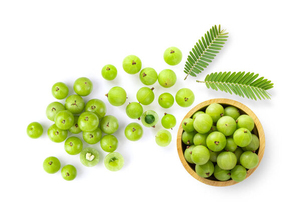 Indian gooseberry with leaf on white background. top view
