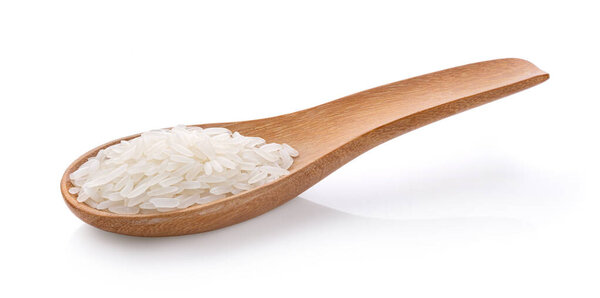 Dry white jasmine rice in wood spoon isolated on a white background
