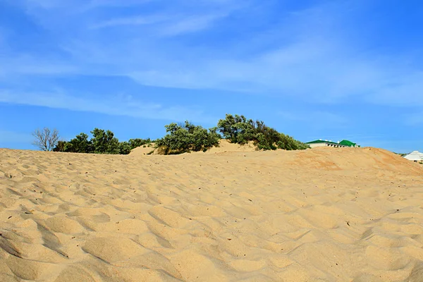 disappearing dunes at the beach