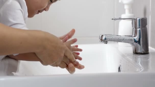 Mom Washes Small Child Hands Soap Sink Water Bathroom Hands — Stock Video