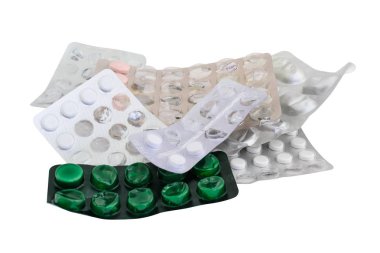 Vakumlu ambalaj tablet tıp ve üzerinde beyaz izole ilaçlar kullanılır. Fotoğraf.