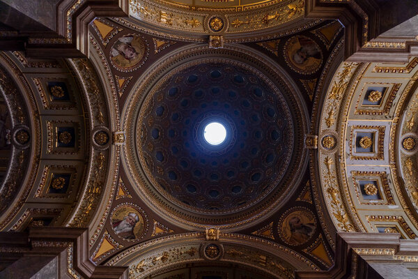 Upward view of cupola with skylight in Stephen's Basilica in Budapest, Hungary