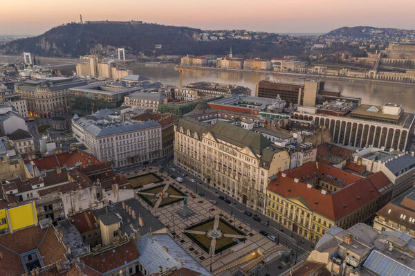 Aerial drone shot of Jozsef Nador Square at dawn in budapet downtown in winter