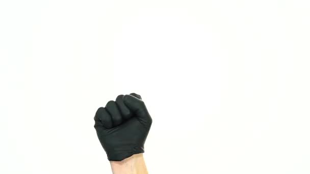 Движение Мужской Руки Черной Резиновой Перчатке Татуировок Рука Показывает Хорошо — стоковое видео