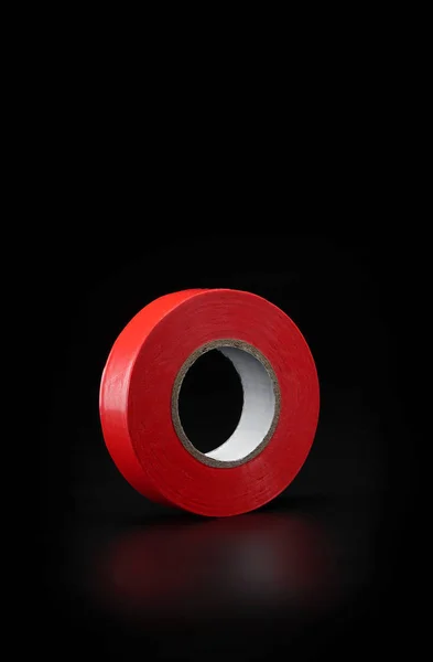 Colored electrical tape on a black background isolate. — Stock Photo, Image