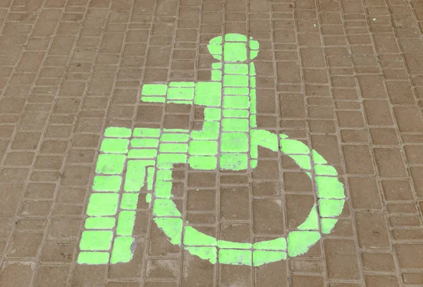 The parking space for disabled people the drawn sign. — Stock Photo, Image