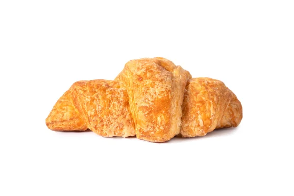 Klasické francouzské croissant sladké pečivo, snídaně k snídani. Na bílém pozadí. Dárek za dovolenou. — Stock fotografie