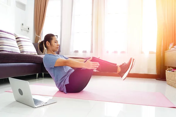 Asian Women Exercise Doing Ups Abs Workout Home Using Laptop — Stock Photo, Image