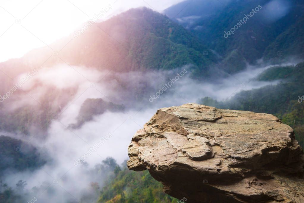 Standing empty on top of a mountain view, Blank space cliff edge with mountain on clouds blue sky