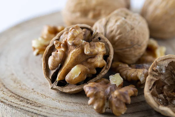 Close up at seed of Walnut Favorite for snack and very delicious.Have a lot of omega 3 for brain.Healthy food concept. on wood background. - Image