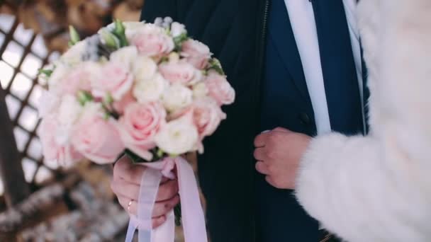 Groom Gives Bouquet Bride Close Female Hands Hold Bouquet Gently — Stock Video