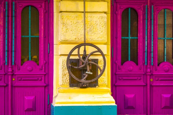 pink door building exterior