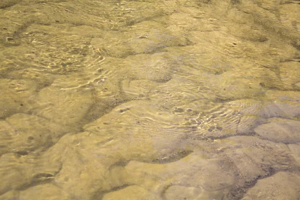 Areia Amarela Textura Fundo Água — Fotografia de Stock