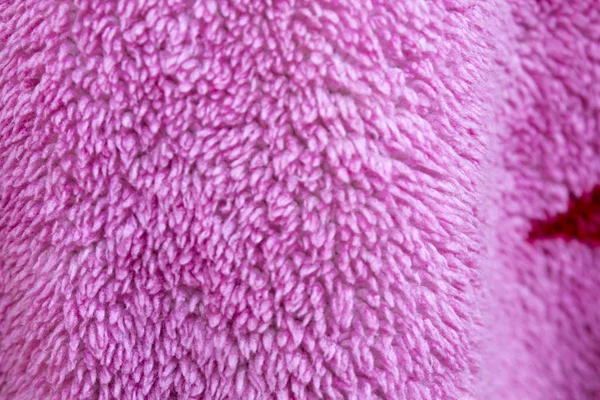 Pink fur fabric background texture