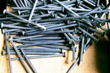 Demir metal çivi arkaplan dokusunu kapat