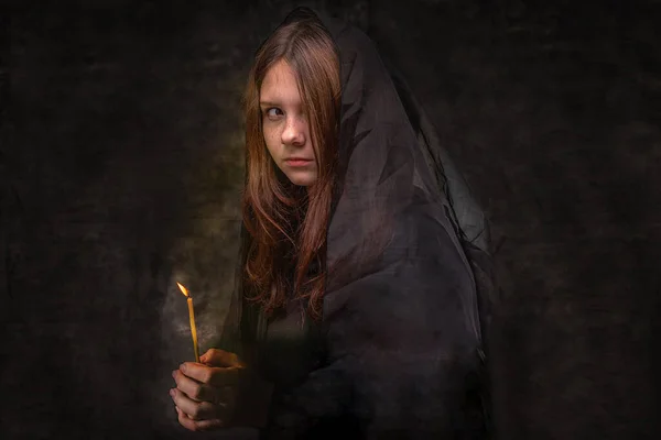 Girl Black Looks Scared Sad Hands Lit Candle Halloween Holidays Royalty Free Stock Photos