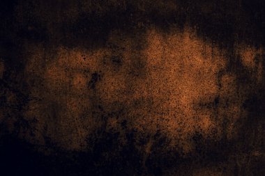 soyut turuncu arkaplan veya birçok kaba sıkıntılı grunge arkaplan dokusuna sahip siyah arkaplan, reklam veya diğer grafik sanat resimleri için merkez spot ışığı metin alanı ile siyah kenarlar