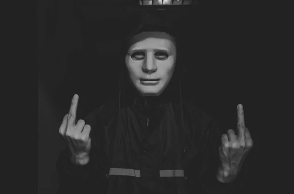 Computer Hacker White Mask Hoodie Obscured Dark Face Showing Fuck — Zdjęcie stockowe