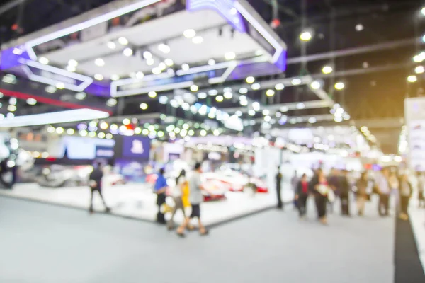 abstract blur, defocused background of event with people in public exhibition hall, Business tradeshow, job fair, or stock market or shopping mall marketing advertisement concept