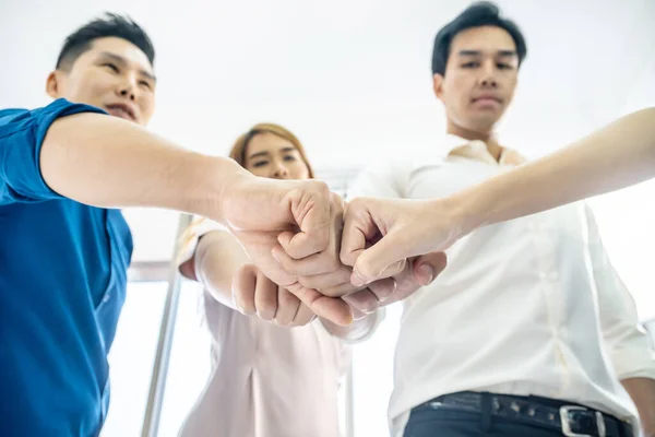 Teamwork business join hand together concept, Image of hands in circle as symbol of their partnership and teamwork,we will do the best concept, Volunteer charity work. People joining for cooperation success business.
