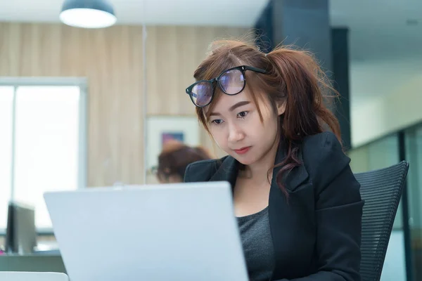 Business woman working in the office,Happy worker concept,Thailand people