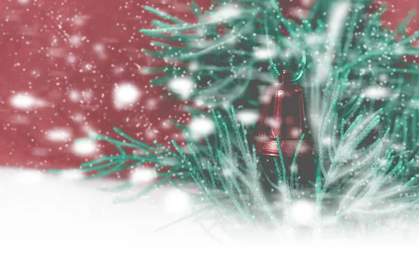 Red Christmas Bell Pine Tree Snow Red Background — Stock Photo, Image