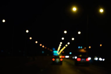 Arkaplan olarak bulanık ışıkları özetle  
