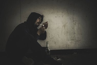 Asian men are drug addicts,Thailand no to drug concept,The bad guy drugs in the desolate,A man smoking