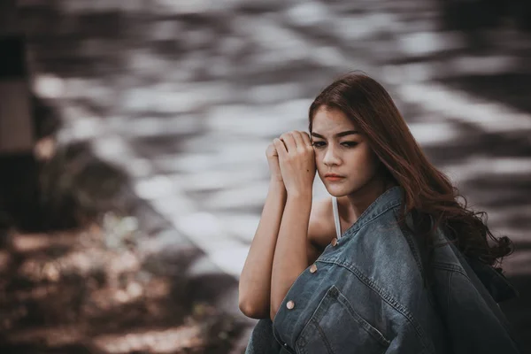 stock image Beautiful thai woman very sad from unrequited love,rethink,think over,vintage style,dark tone,broken heart,asian girl