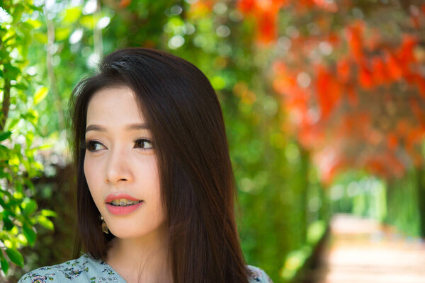 Portrait of beautiful asian woman,Thailand people,Lovely girl take a picture