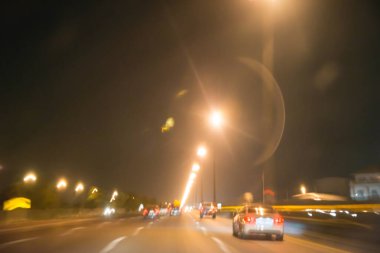 Arkaplan olarak bulanık ışıkları özetle  