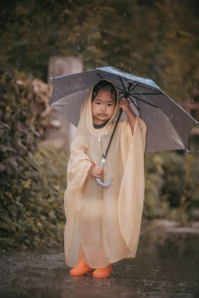 Portrait Cute Little Girl Wearing Raincoat Holding Umbrella Raining Thailand — Stock Photo, Image