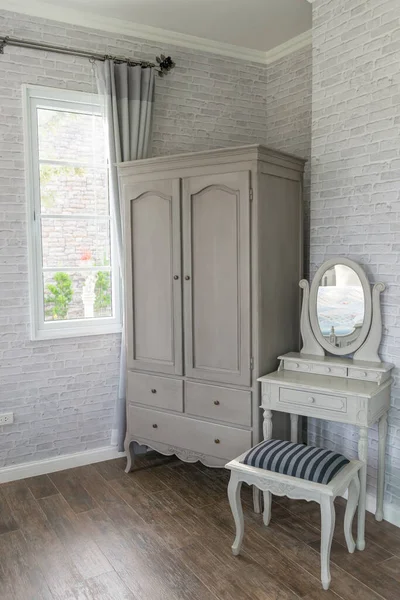 Modern luxury wardrobe and dressing table gray style in the bedroom,corner for dressing,low light room,sunny from window